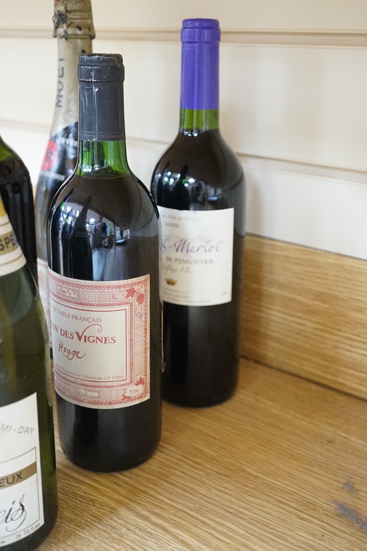 Twelve bottles of assorted wine to include Pauillac 1990, Chateaux Perenne 1985, Latriciere Chambertin 1949, Moet etc.